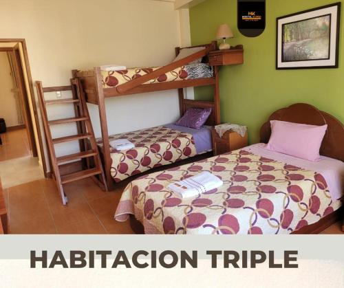 Двуетажно легло или двуетажни легла в стая в Amplio Departamento con terraza