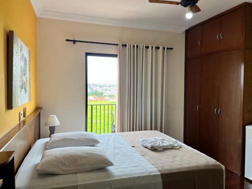Hotel São Marcos Orlândia SPにあるベッド