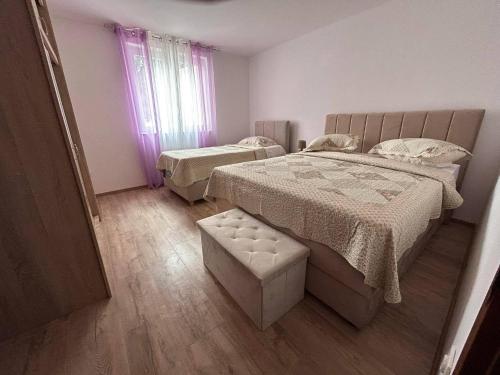 Posteľ alebo postele v izbe v ubytovaní Apartments by the sea Zaton, Zadar - 12988