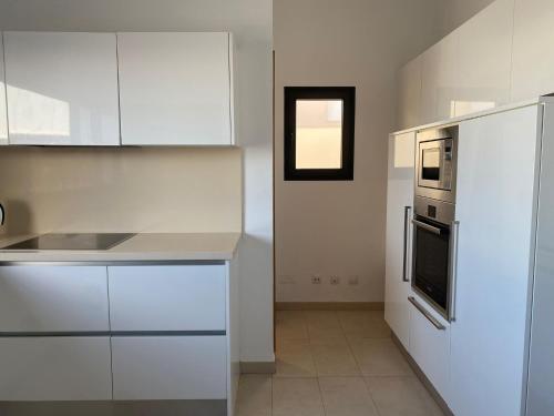 Η κουζίνα ή μικρή κουζίνα στο Villas Quintero
