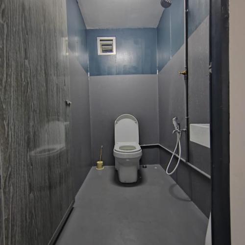 Kylpyhuone majoituspaikassa Pak Long Man Roomstay