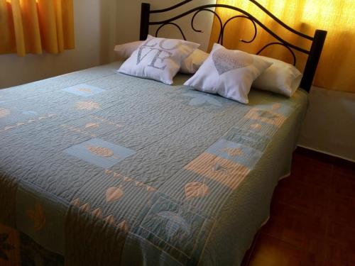 Кровать или кровати в номере Vicos