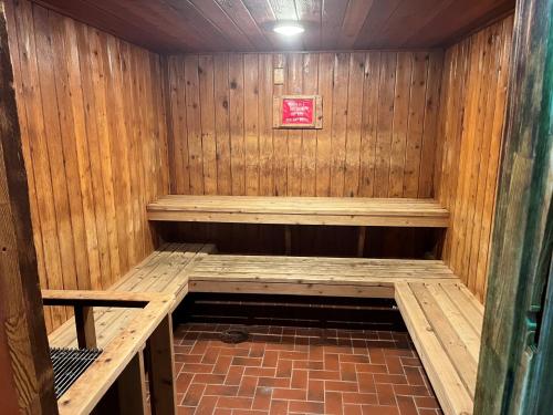 an inside of a wooden sauna at Holiday Inn Detroit Lakes by IHG in Detroit Lakes