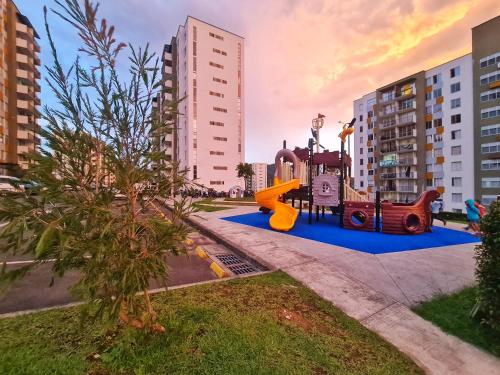 a playground in the middle of a city at Apartamento compartido en dosquebradas in Dosquebradas