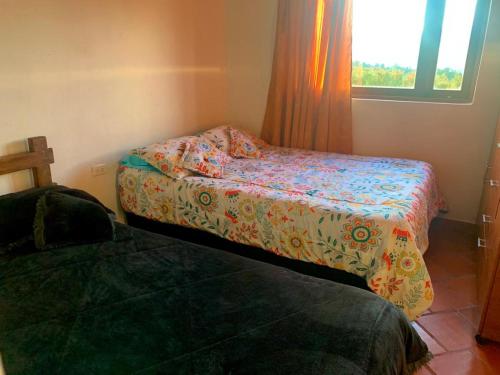 เตียงในห้องที่ Casa campestre Donde Aleja