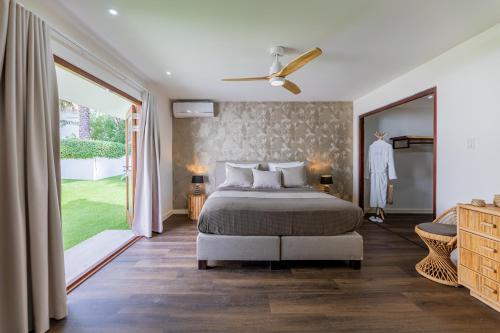 Ένα ή περισσότερα κρεβάτια σε δωμάτιο στο Deluxe Villa Colibri Curacao