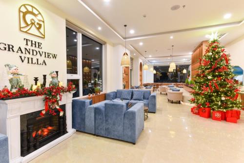 a christmas tree in the lobby of a cranleigh villa at The Grandview Villa Dalat in Da Lat