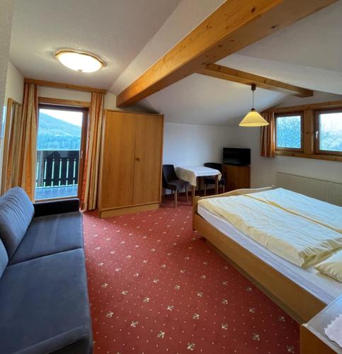 Katil atau katil-katil dalam bilik di Hotel Hemetsberger