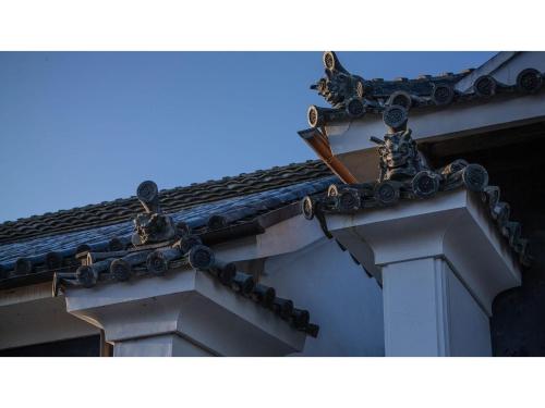 a building with a cross on the side of it at PAYSAGE MORIGUCHI - Vacation STAY 32994v in Mima