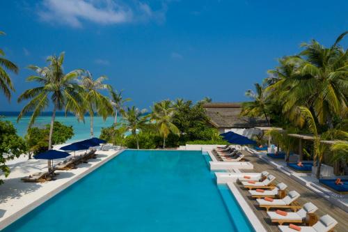 a view of the pool at the resort at Emerald Faarufushi Resort & Spa - Deluxe All Inclusive in Raa Atoll