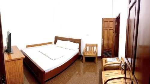 Postel nebo postele na pokoji v ubytování Nam Khánh Motel