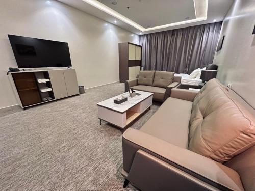 Televisyen dan/atau pusat hiburan di فندق قمم بارك Qimam Park Hotel 7