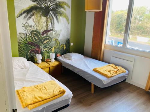 Posteľ alebo postele v izbe v ubytovaní Charmante maison familiale entre mer et forêt
