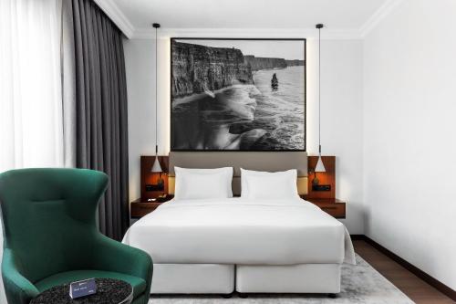 Кровать или кровати в номере Radisson Blu Hotel, Tashkent