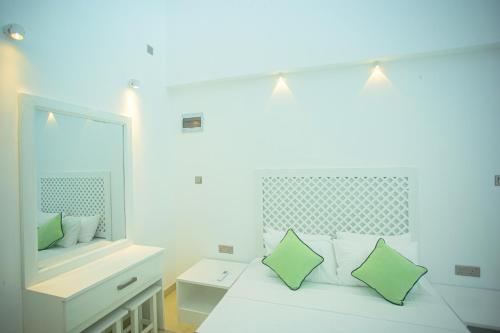 Ein Bett oder Betten in einem Zimmer der Unterkunft Greencliff Mirissa