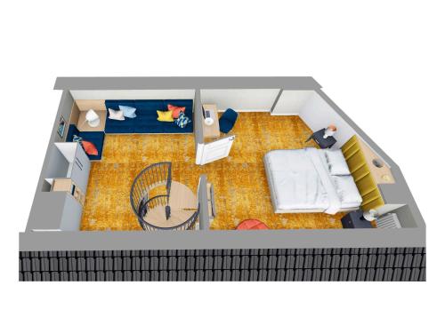 a model of a room with a bedroom and a bed at Boulevard Boutique Suites in Łeba