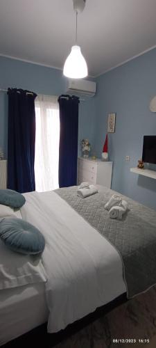 Ένα ή περισσότερα κρεβάτια σε δωμάτιο στο MarilidiaHouse