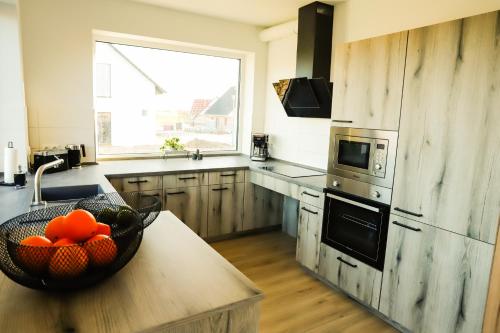 Dapur atau dapur kecil di Ferienhaus am Tramser See