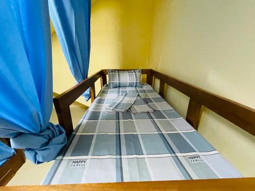 Voodi või voodid majutusasutuse Luanda City Hostel toas
