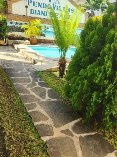 Kolam renang di atau dekat dengan Pendo Villas Diani Beach