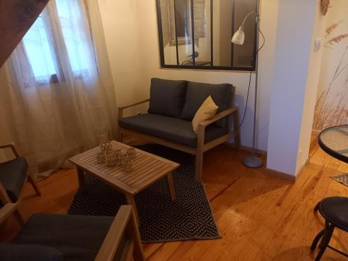 Χώρος καθιστικού στο Chambres d'hôtes Le Gentil Home
