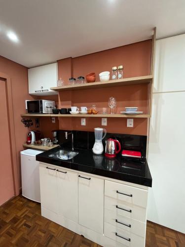 Dapur atau dapur kecil di Suíte Horto