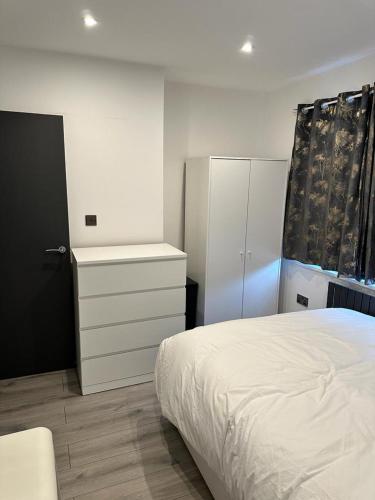 Posteľ alebo postele v izbe v ubytovaní HOME SWEET HOME