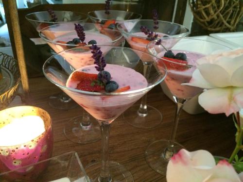 a group of wine glasses with fruit in them at Gästehaus Weiherhof in Alpbach