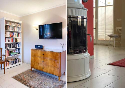 two pictures of a living room with a fish tank at Strandhaus Usedom in Stubbenfelde