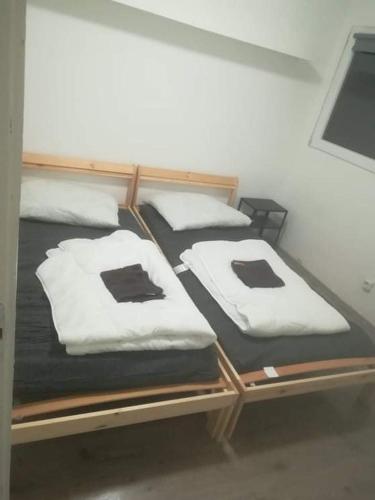 Кровать или кровати в номере Koszegi Kis-Kakas - 2 haloszoba+nappalis - sorhaz !