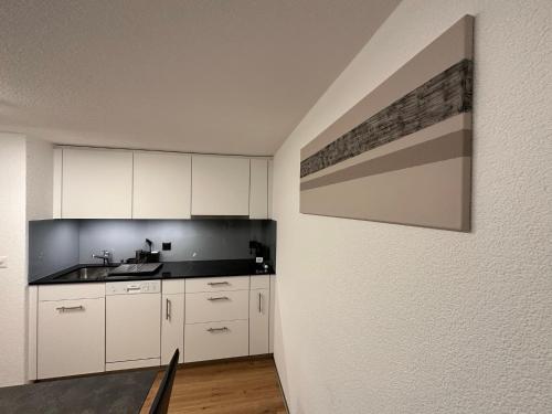 Kuchyň nebo kuchyňský kout v ubytování Apartment Enzian