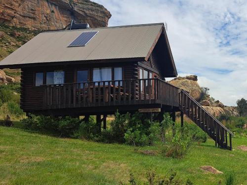 a house with a solar panel on top of it at Mount Everest Guest Farm in Harrismith