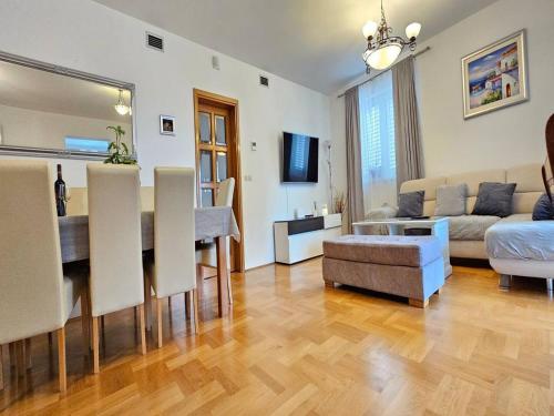 a living room with a couch and a table at Apartment Dijana in Dubrovnik