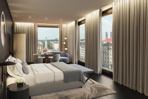 a bedroom with a bed and a room with windows at Koenigshof, a Luxury Collection Hotel, Munich in Munich