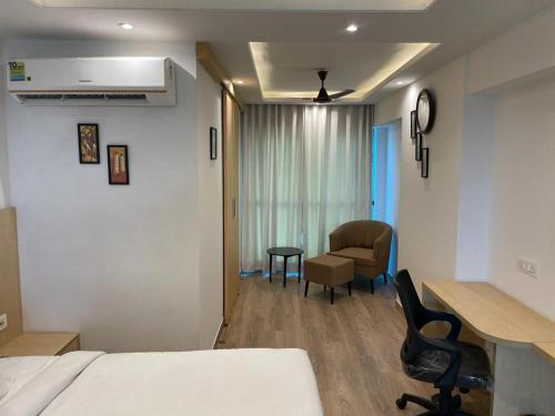 En eller flere senge i et værelse på 1 bedroom self catring apartment