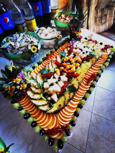 a large platter of food on a table at Harmont Montis- dawna Zającówka- IDEALNA lokalizacja - leśna enklawa w centrum miasta! Sauna, masaże, zabiegi spa! in Szklarska Poręba