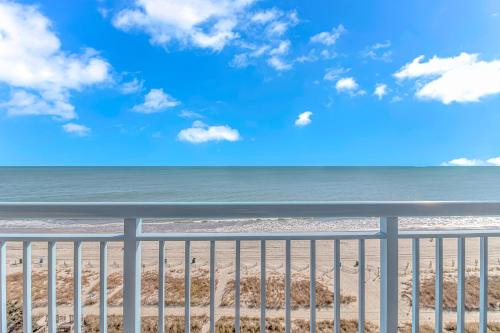 a view of the beach from the balcony at Immaculate! Beautifully Renovated Oceanfront 1 Bedroom Suite - Sleeps 6! - Roxanne Towers Unit 804 in Myrtle Beach