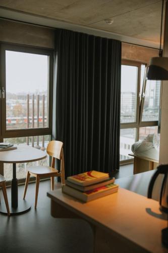 Ein Sitzbereich in der Unterkunft Hotel Jansen Amsterdam Bajeskwartier