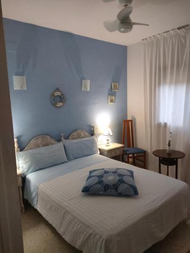 Postel nebo postele na pokoji v ubytování Hostal Los Pinares