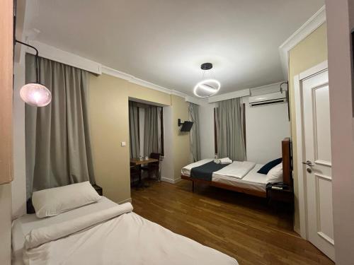 Krevet ili kreveti u jedinici u okviru objekta Volga Rika Hotel