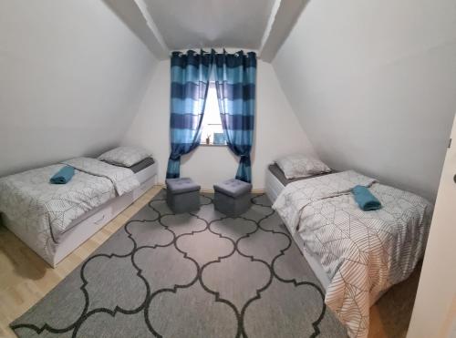 Postel nebo postele na pokoji v ubytování Ferienhaus Alexandra