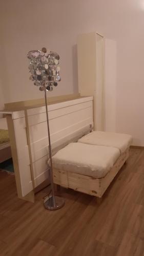 En eller flere senge i et værelse på Le petit nid