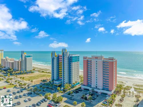 an aerial view of a city and the beach at Immaculate! Beautifully Renovated Oceanfront 1 Bedroom Suite - Sleeps 6! - Roxanne Towers Unit 804 in Myrtle Beach