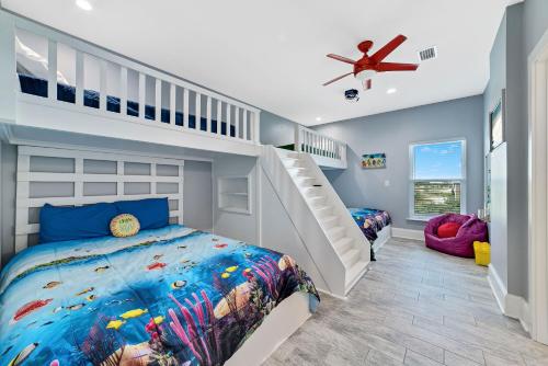 a childs room with a mermaid themed bedroom at Ocean Overlook in Gulf Shores