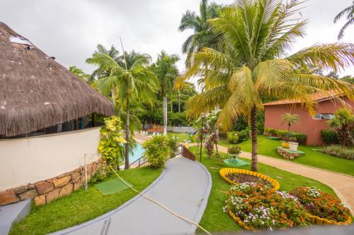 a view of a resort with a garden at HOT SPRINGS HOTEL - BVTUR in Caldas Novas