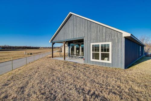 a house on a hill with a field at Near Shangri-La Lake-View Monkey Island Home! in Afton