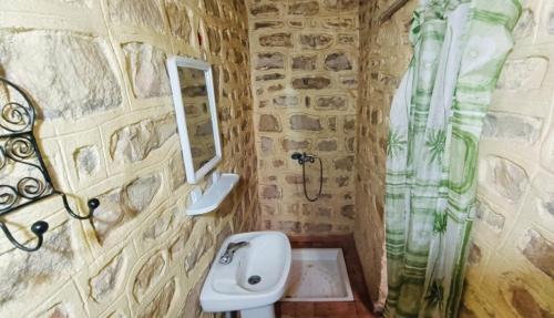 Ein Badezimmer in der Unterkunft Kasbah Dar Talouste