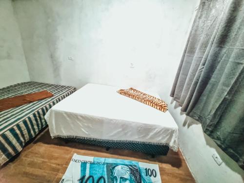 Un pat sau paturi într-o cameră la RANCHO GABRIEL