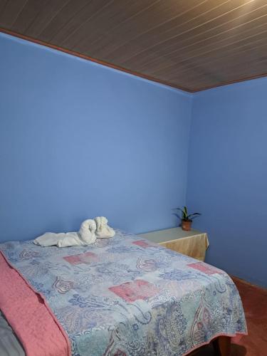 Una cama o camas en una habitación de Posada Don Juan