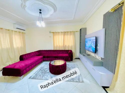 Posezení v ubytování Appartement Rapha'ella Meublé